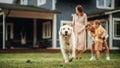 Portrait of a Happy Young Family Couple with Kids and a Golden Retriever Sitting on a Grass at Home Royalty Free Stock Photo