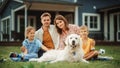 Portrait of a Happy Young Family Couple with a Son and Daughter, and a Noble White Golden Retriever Royalty Free Stock Photo