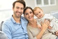 Portrait of happy young family enjoying at home Royalty Free Stock Photo