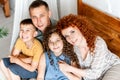 Portrait of a happy young family with two children Royalty Free Stock Photo