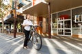 Portrait of happy young female bicyclist Royalty Free Stock Photo