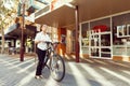 Portrait of happy young female bicyclist