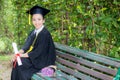 Portrait of happy young female graduates in academic dress Royalty Free Stock Photo