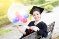 Portrait of happy young female graduates in academic dress Royalty Free Stock Photo