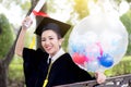 Portrait of happy young female graduates in academic dress Royalty Free Stock Photo