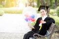 Portrait of happy young female graduates in academic dress Royalty Free Stock Photo