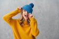 Portrait of a happy young girl dressed in winter clothes Royalty Free Stock Photo