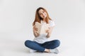 Portrait of a happy young girl holding book Royalty Free Stock Photo