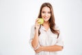 Portrait of a happy young girl holding green apple Royalty Free Stock Photo