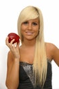 Portrait of a happy young girl holding red apple Royalty Free Stock Photo