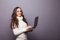 Portrait of a happy young girl with laptop computer Royalty Free Stock Photo