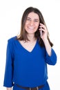 Portrait of happy young girl talking phone in hand on white background Royalty Free Stock Photo