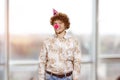 Portrait of happy young guy with clown nose. Royalty Free Stock Photo