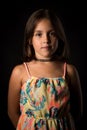 Portrait of happy young little girl with emotions on black Royalty Free Stock Photo