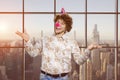 Portrait of a happy young man with clown nose. Royalty Free Stock Photo