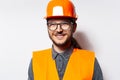 Portrait of happy young man, construction worker. Wearing orange hard hat Royalty Free Stock Photo