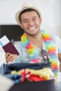 portrait happy young man holding passport Royalty Free Stock Photo