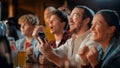 Portrait of a Happy Young Man Holding a Smartphone, Anxious About the Sports Bet on a Soccer Match Royalty Free Stock Photo