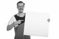 Portrait of happy young man with mustache holding white board Royalty Free Stock Photo