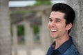 Portrait of a happy young man smiling outdoors Royalty Free Stock Photo