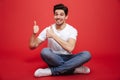 Portrait of a happy young man in white t-shirt Royalty Free Stock Photo