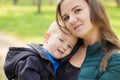 Portrait of a happy young mother holding a smiling son Royalty Free Stock Photo