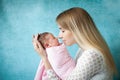 Portrait of mother hugging her newborn baby girl Royalty Free Stock Photo