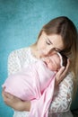 Portrait of mother hugging her newborn baby girl Royalty Free Stock Photo