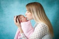 Portrait of mother hugging her newborn baby girl Royalty Free Stock Photo