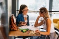 Portrait of happy young people studying together in a library. Education study teenager concept Royalty Free Stock Photo