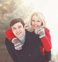 Portrait happy young smiling couple in love having fun at winter day Royalty Free Stock Photo