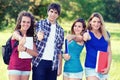 Portrait happy young students in park Royalty Free Stock Photo