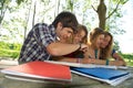 Portrait happy young students in park Royalty Free Stock Photo