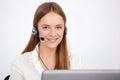 Portrait of happy young support phone operator with headset. Royalty Free Stock Photo