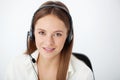 Portrait of happy young support phone operator with headset. Royalty Free Stock Photo