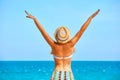 Portrait happy of young woman on the beach near the sea standing Royalty Free Stock Photo