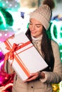 Portrait of happy young woman christmas present boxes. Royalty Free Stock Photo