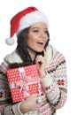 Portrait of happy young woman with Christmas present Royalty Free Stock Photo