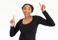 Portrait of happy young woman dancing against white background Royalty Free Stock Photo