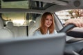 Portrait of happy young woman driving car Royalty Free Stock Photo