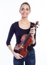 Portrait of happy young woman holding violin Royalty Free Stock Photo