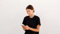 Portrait of happy young woman reading or texting message Royalty Free Stock Photo