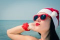 Portrait of a happy young woman in Santa Claus hat Royalty Free Stock Photo