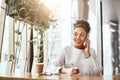 The value of an idea lies in the using of it. Attractive business woman working at desk in modern office.