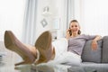 Portrait of happy young woman talking cell phone Royalty Free Stock Photo