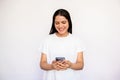 Portrait of happy young woman texting or reading message Royalty Free Stock Photo