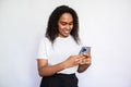 Portrait of happy young woman texting or reading message Royalty Free Stock Photo