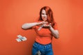 Portrait of a happy young woman, throwing banknotes Royalty Free Stock Photo