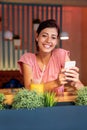 Portrait of happy young woman using smartphone. People mobile phone communication work concept