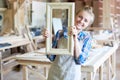 Cheerful Female Carpenter Posing in Joinery Royalty Free Stock Photo